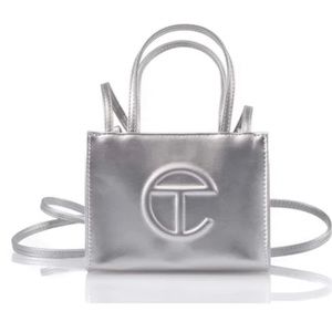 New with tags (never used) small silver telfar bag